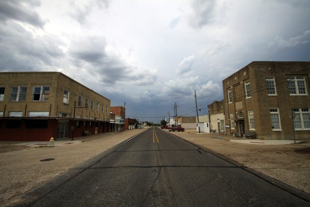 Brick commercial blocks on the main street in Frost, photographed in 2014